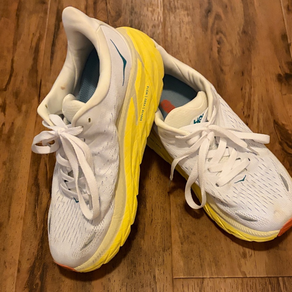 Hoka White Sneakers with Yellow Midsole and Teal Accents